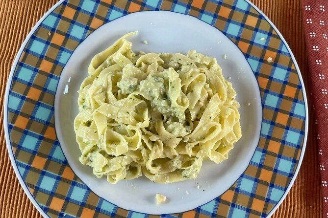 3 Hour Private Italian Tradition Cooking Class in Brescia - The personal touches: artwork, conversation, and a limoncino gift