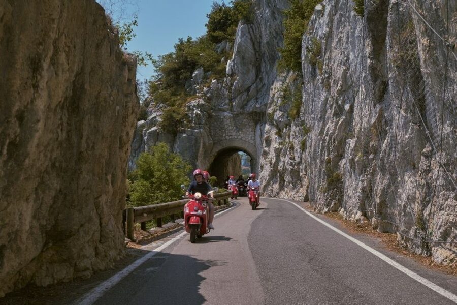 Desenzano del Garda: Lake Garda app-guided Vespa tour - Riding Lake Garda highlights: ferry, Strada della Forra, and the 300-meter views