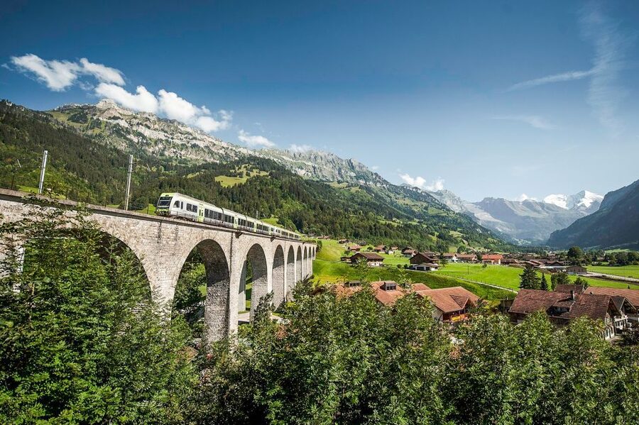 From Milan: Interlaken & Swiss Alps Day Trip - Milan to Domodossola: starting with a coach and a border rhythm