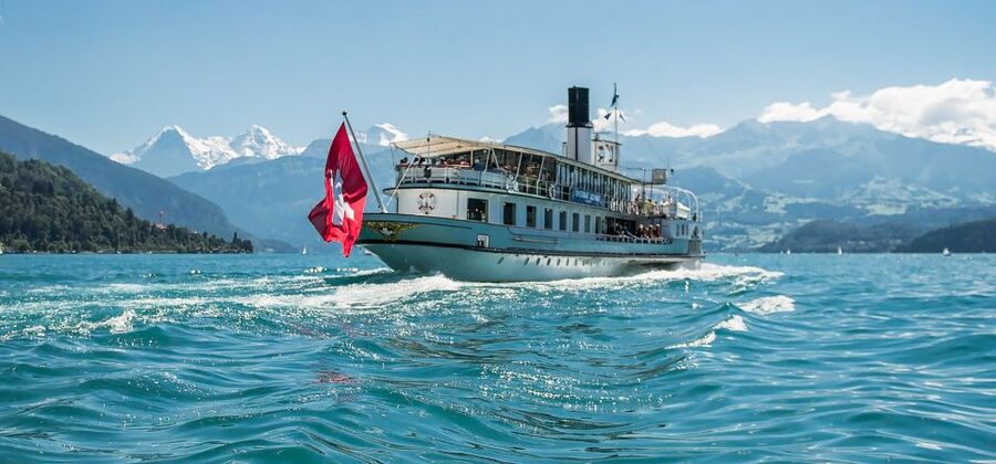 From Milan: Interlaken & Swiss Alps Day Trip - Spiez and the Lake Thun cruise: the Eiger trio photo moment