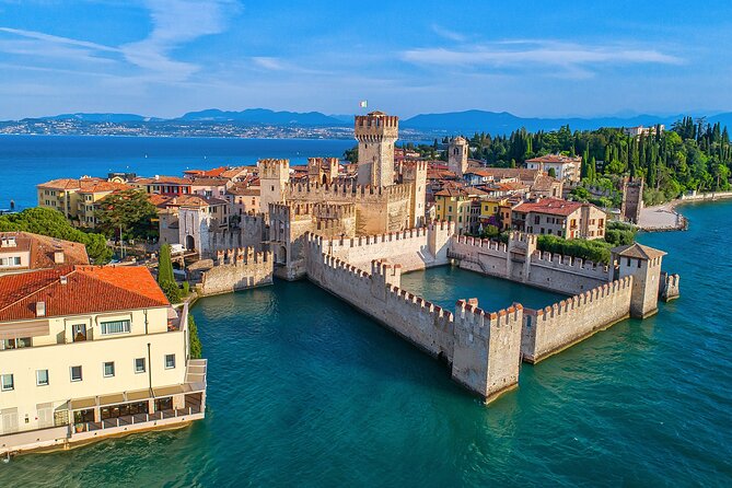 From Milan: Verona, Sirmione and Lake Garda Tour with Boat Cruise - Sirmione stroll: choosing Grotte di Catullo or Scaligero Castle