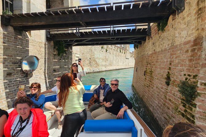 From Milan: Verona, Sirmione and Lake Garda Tour with Boat Cruise - Lake Garda by boat cruise, and the weather rule that matters