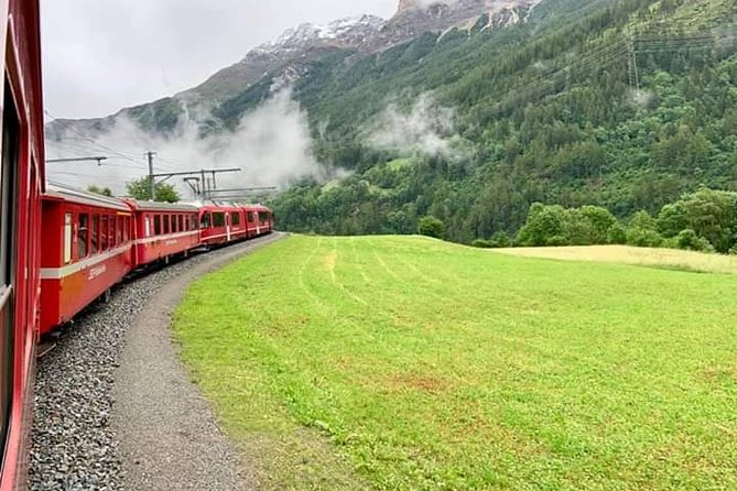 Intimate Small-Group Bernina UNESCO Scenic Train on Swiss Alps - Riding the Bernina train: the main event (and why the disembark stop matters)