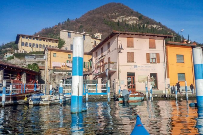 Kayak Trip to Monte Isola, on Iseo lake - Paddling along Monte Isola shore to Peschiera Maraglio