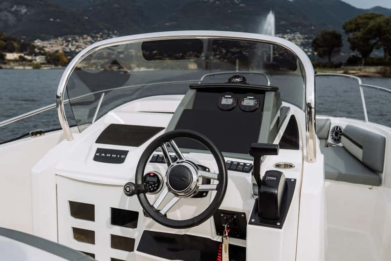 Lake Como: 2h Shared Boat Tour with Wine Tasting - Villa Pliniana swimming and the luxury hotels you pass by