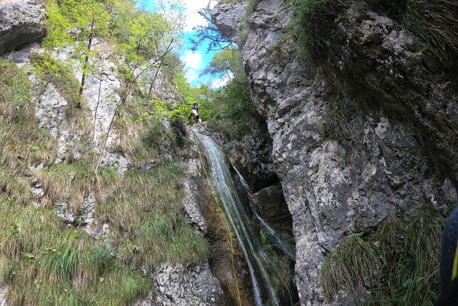 Level 1 Canyoning: Vione torrent with canyoning guide - What happens on the route: jumps, slides, and rope abseils