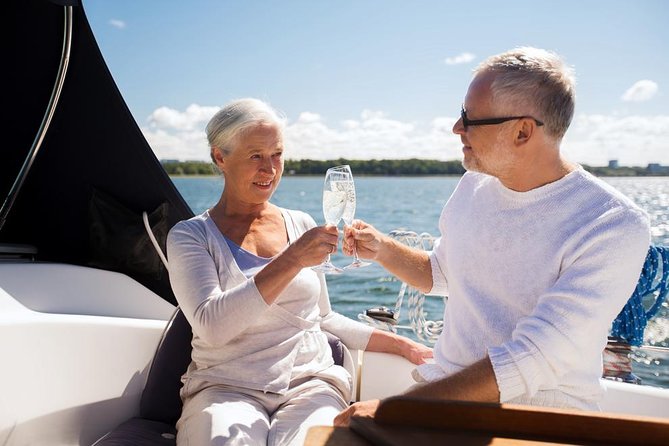 Micaela's exclusive private sunset cruise on lake Maggiore - Borromean Islands, Shoreline Villas, and Alpine Peaks at Golden Hour
