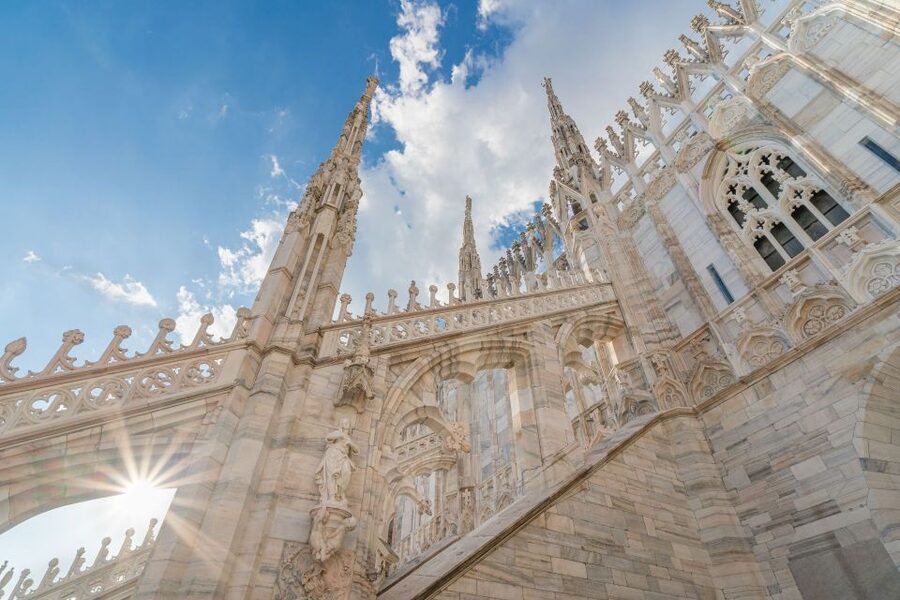 Milan: Duomo Rooftop and Cathedral Guided Tour with Tickets - Inside the cathedral: the art and the centuries behind the stone