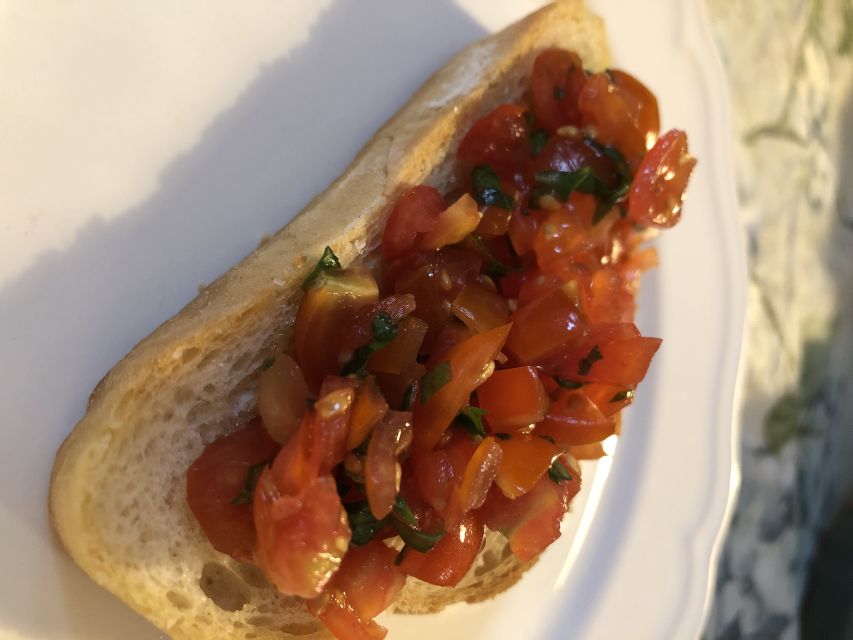 Milan: Italian Cooking Class with Food and Wine - The meal: wine, group chatting, and eating your own work