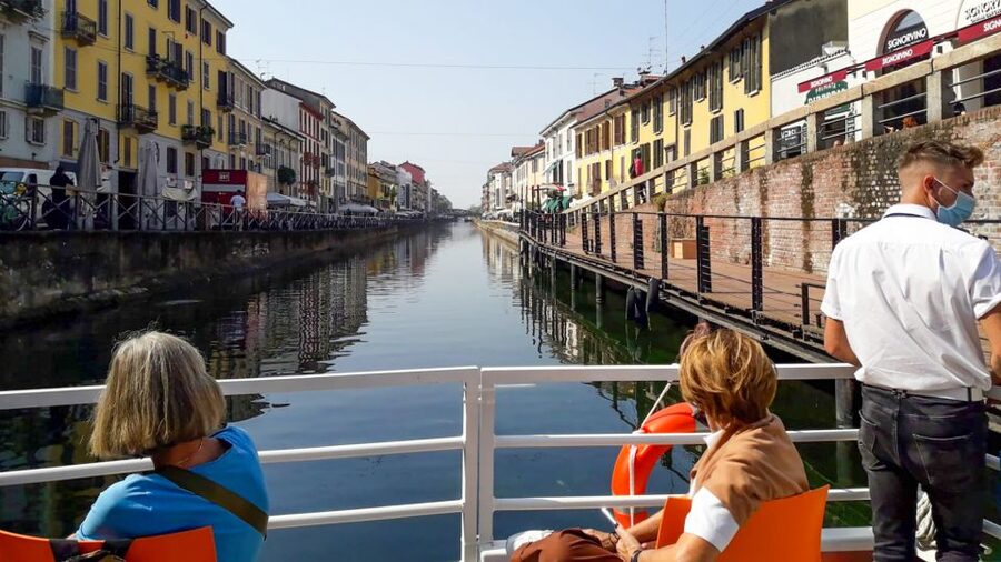Milan: Navigli District Canal Boat Tour with Aperitivo - Onboard vibe: how much music, and how the audio guide fits in
