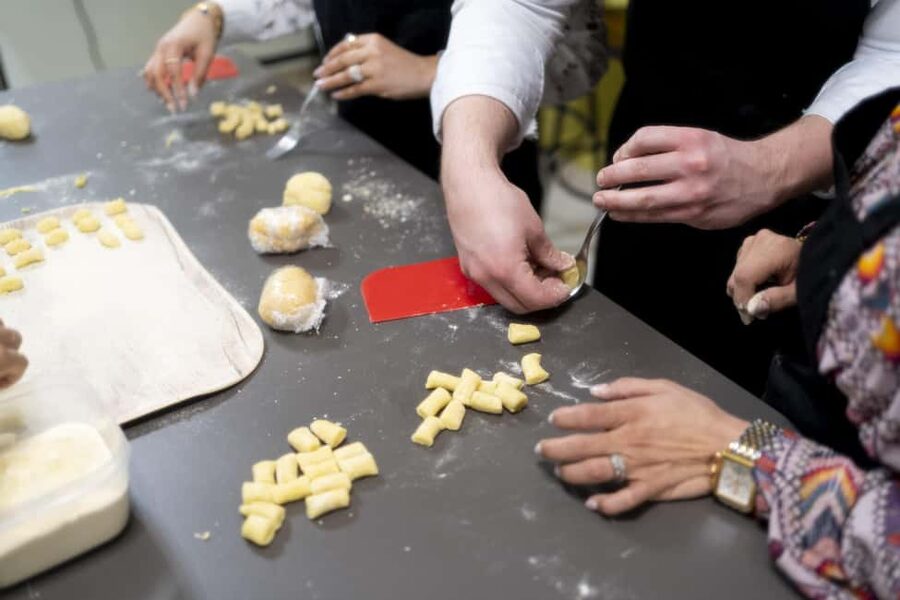 Milan: Pasta, Gnocchi and Tiramisù Cooking Class with Wine - What you get beyond the food: recipes booklet, market tips, and take-home value