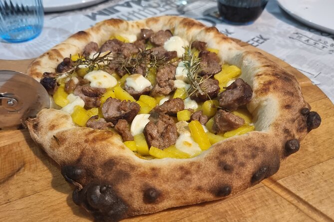 Neapolitan DOC Pizza Class And Cooking in a Wood Oven at a Local's house - The wood-burning oven: beech wood, real heat, real timing