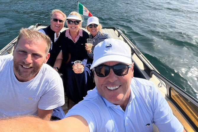 Private Boat Tour Como Wooden Classic Boat - What your skipper shows you, villas, landmarks, and famous shoreline views