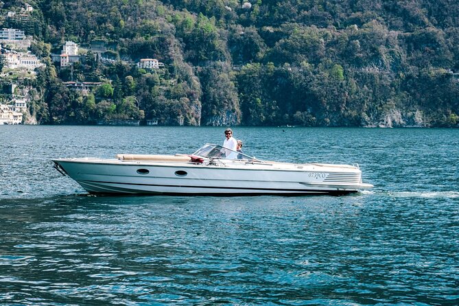 Private Boat Tour with Open Bar Lake Como 7 Pax - Como shoreline to the Life Electric sculpture: a quick start with real variety