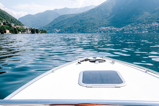Private Cruise on Lake Como with Speedboat from 1H to 4H - Como waterfront, “Life Electric,” and Villa Olmo views from the pier